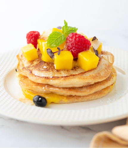 Fruits like bananas with agave syrup make pancakes a delicious vegan treat